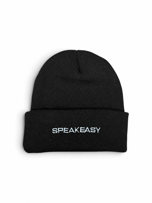 Black cuffed knit beanie with SPEAKEASY embroidered in white on the cuff